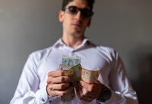 Anti-money laundering investigation representing a cross-border asset freeze and bank liquidity pressure