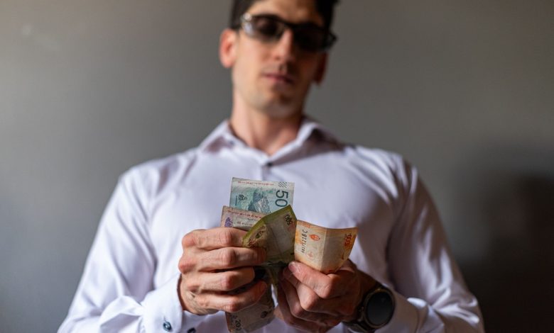 Anti-money laundering investigation representing a cross-border asset freeze and bank liquidity pressure