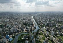 Aerial view of a river and urban area in Bangladesh. Photo by MSI Sakib on Unsplash.