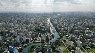 Aerial view of a river and urban area in Bangladesh. Photo by MSI Sakib on Unsplash.