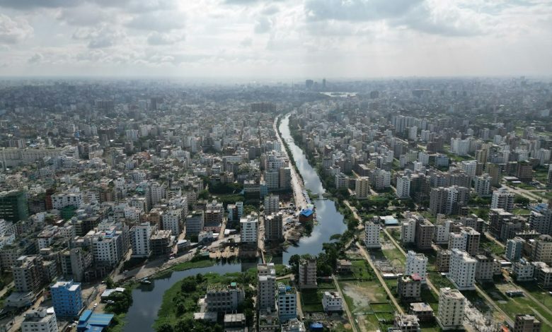 Aerial view of a river and urban area in Bangladesh. Photo by MSI Sakib on Unsplash.