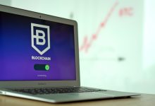 Laptop and cryptocurrency imagery representing cybercrime and illicit finance networks