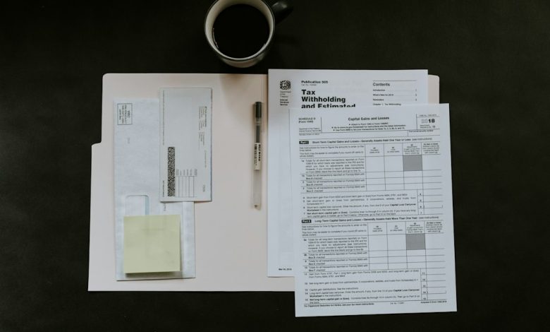 Generic financial documents illustration for a money-laundering enforcement article. Photo by Kelly Sikkema on Unsplash.